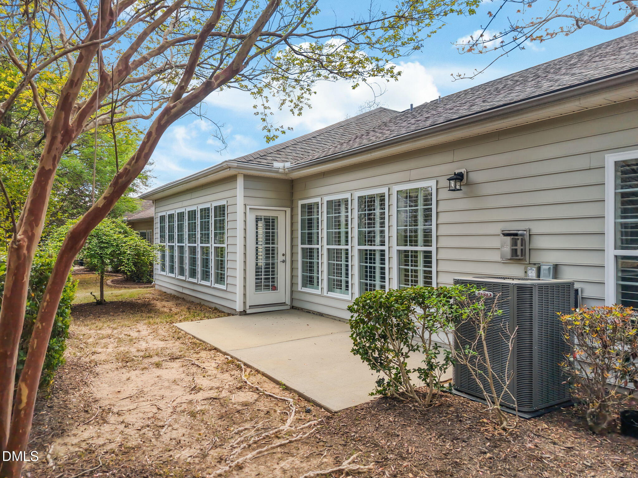 268 Beckingham Loop Cary, NC 27519 - Photo 29 of 36 a view of a house with a yard and potted plants