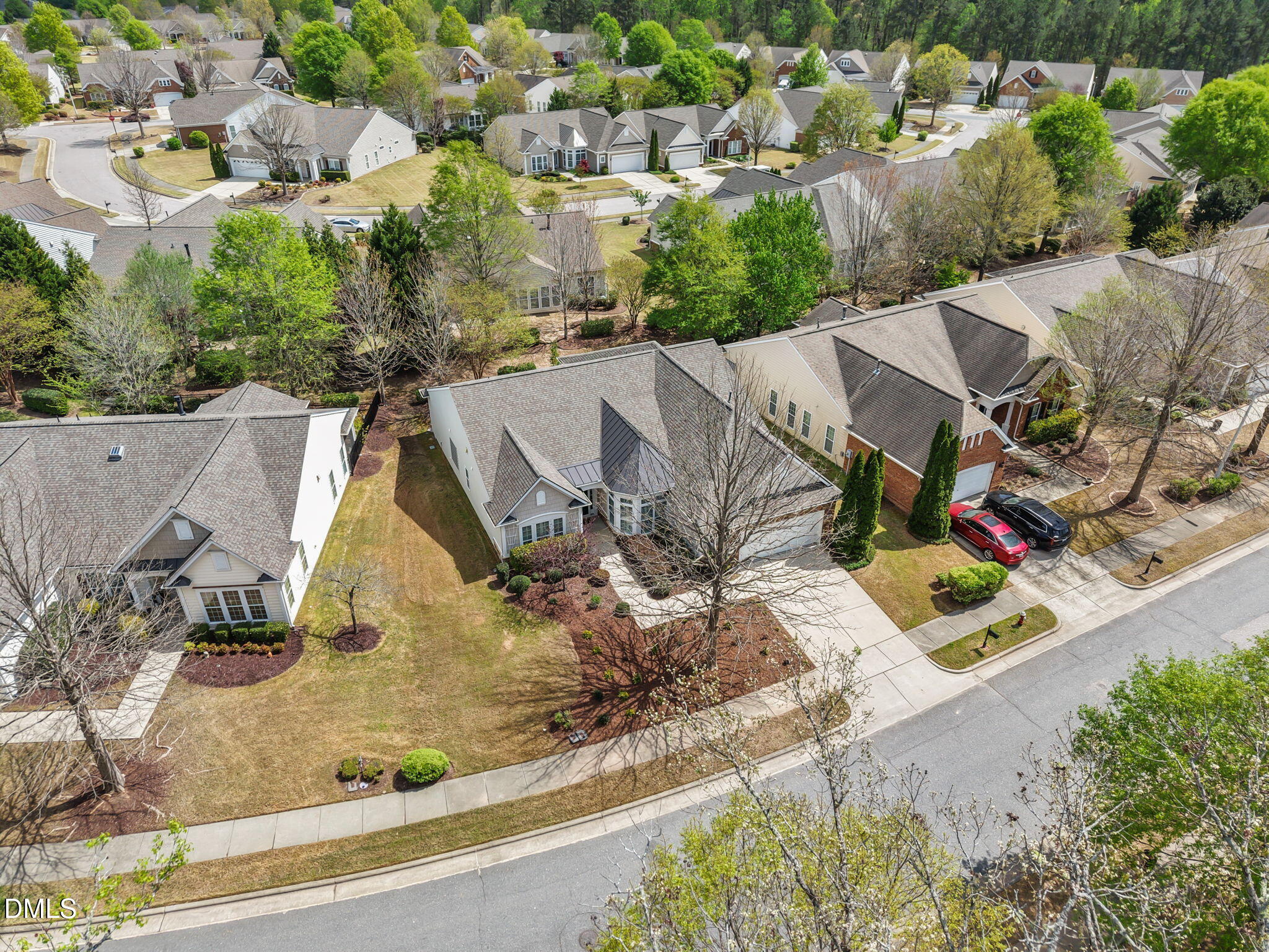 268 Beckingham Loop Cary, NC 27519 - Photo 31 of 36 an aerial view of a house with garden space and street view