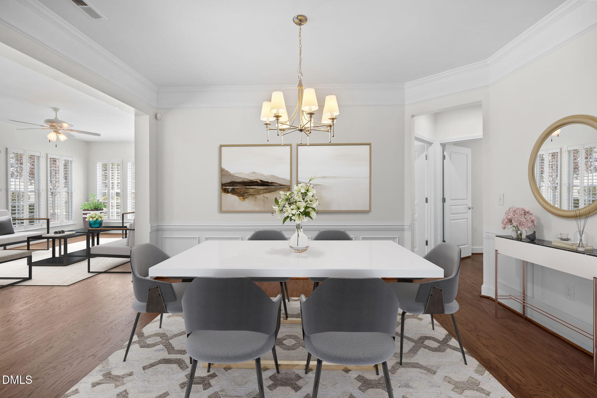 268 Beckingham Loop Cary, NC 27519 - Photo 5 of 36 a view of a dining room with furniture a chandelier and wooden floor