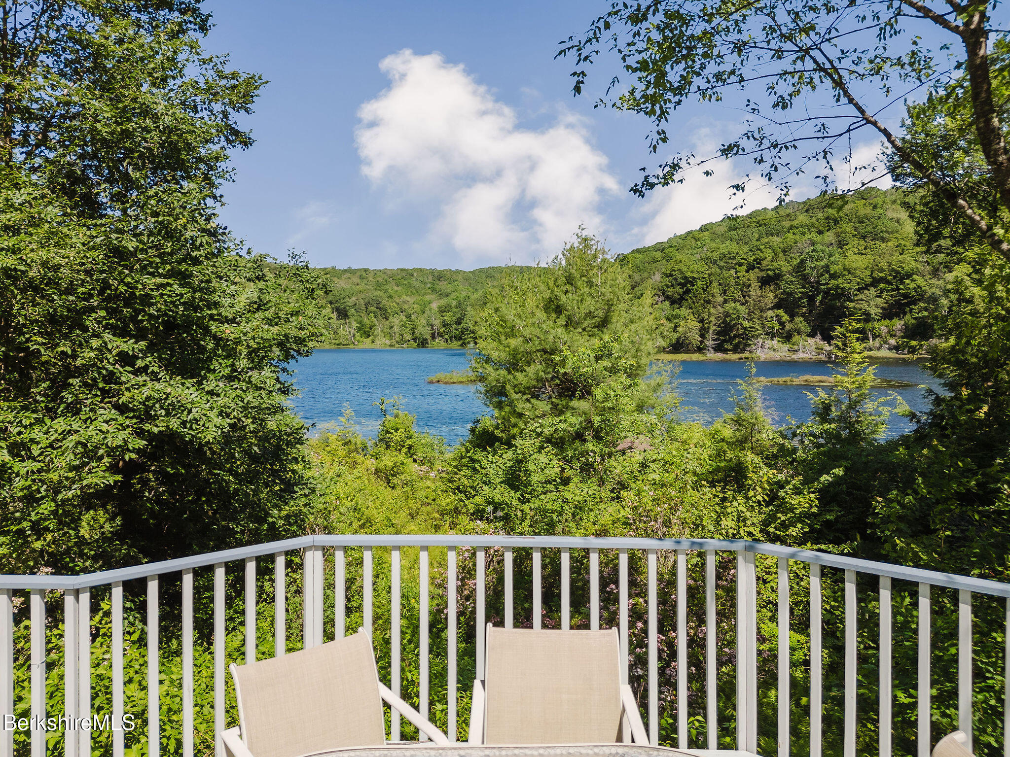 119 Hayes Pond Road Otis, MA 01253 - Photo 17 of 50 Deck Looking Over Water