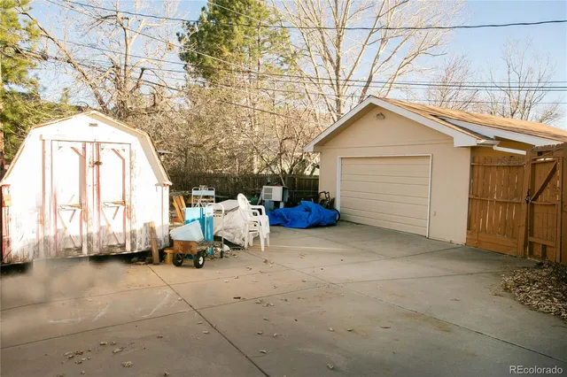 a view of a house with a snow in the yard