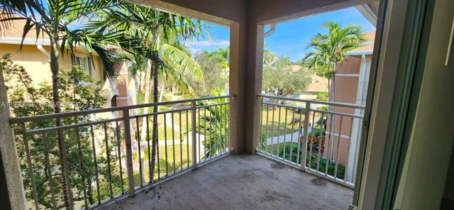 a view of a balcony with lake view
