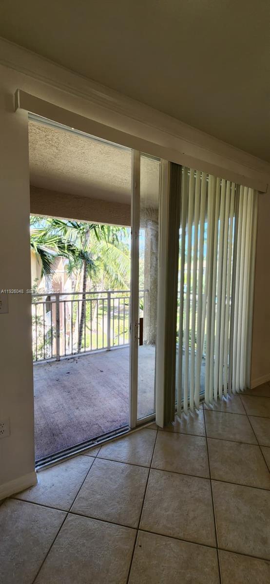 6505 Emerald Dunes Drive, Unit 307 West Palm Beach, FL 33411 - Photo 11 of 17 a view of front door