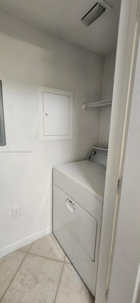 6505 Emerald Dunes Drive, Unit 307 West Palm Beach, FL 33411 - Photo 10 of 17 a view of washer and dryer