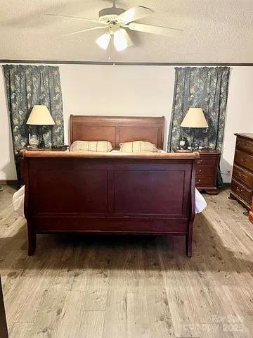 a view of swimming pool with furniture