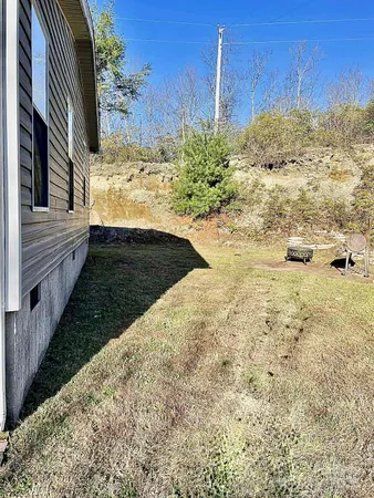 a view of a yard with an trees