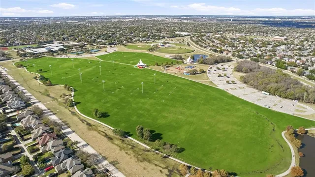 an aerial view of a house with outdoor space