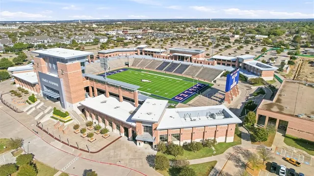 an aerial view of a house with a ocean view