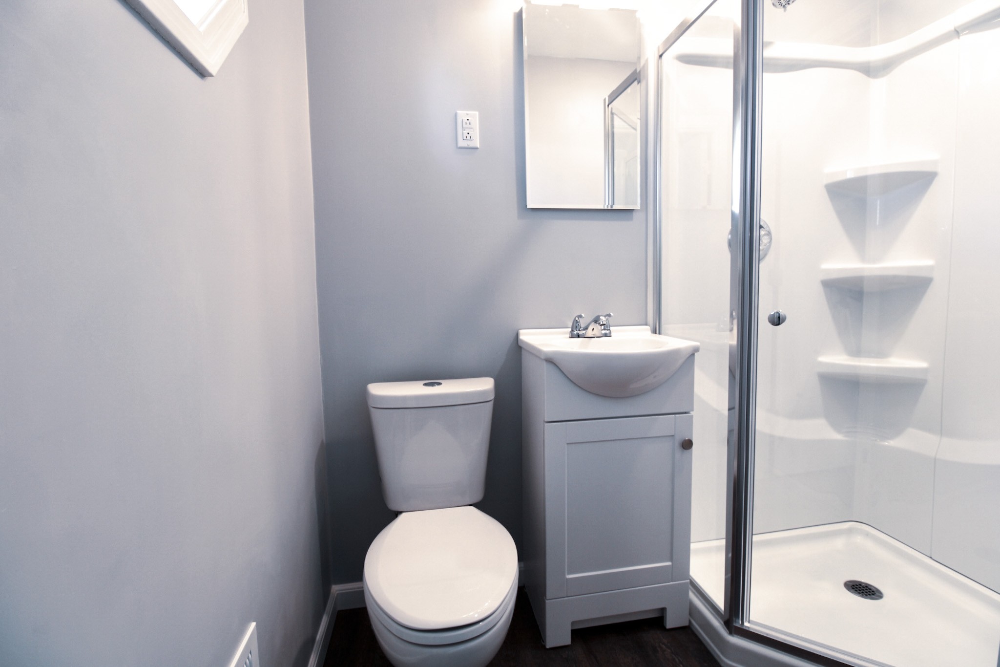 212 Cunningham Lane Clarksville, TN 37042 - Photo 16 of 19 a white toilet sitting next to a bathroom sink