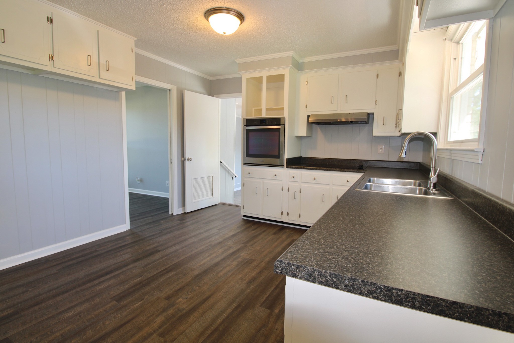 212 Cunningham Lane Clarksville, TN 37042 - Photo 8 of 19 a kitchen with a sink and a stove top oven