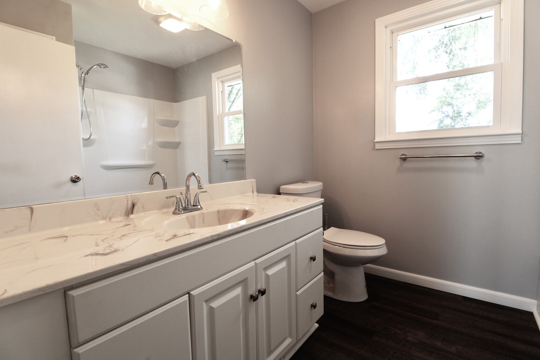 212 Cunningham Lane Clarksville, TN 37042 - Photo 10 of 19 a bathroom with a granite countertop sink toilet and a mirror