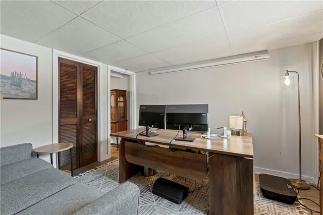 a bathroom with a sink mirror vanity and toilet