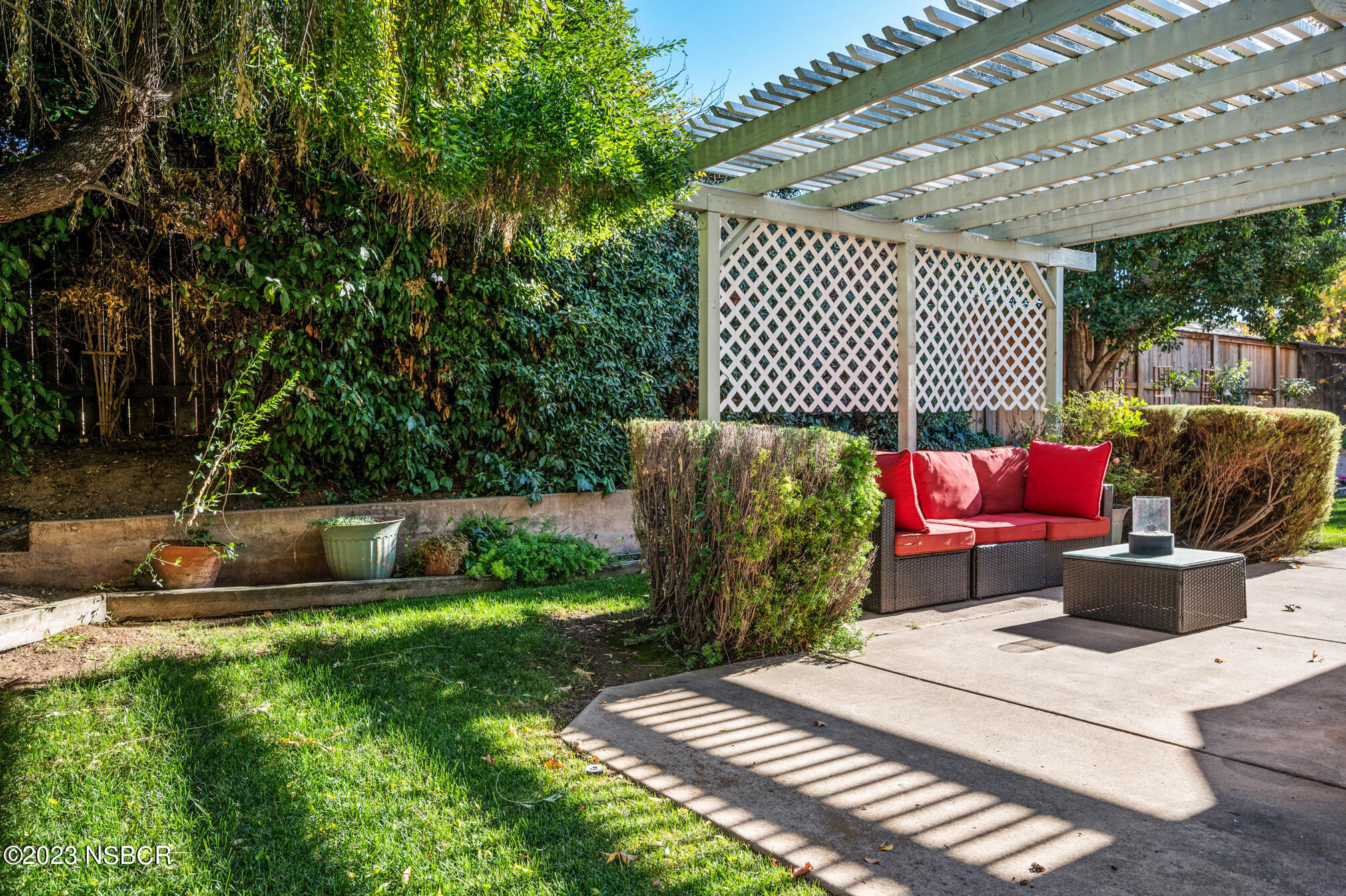 246 Ranch Road Buellton, CA 93427 - Photo 19 of 21 a view of a patio with chairs and a fire pit