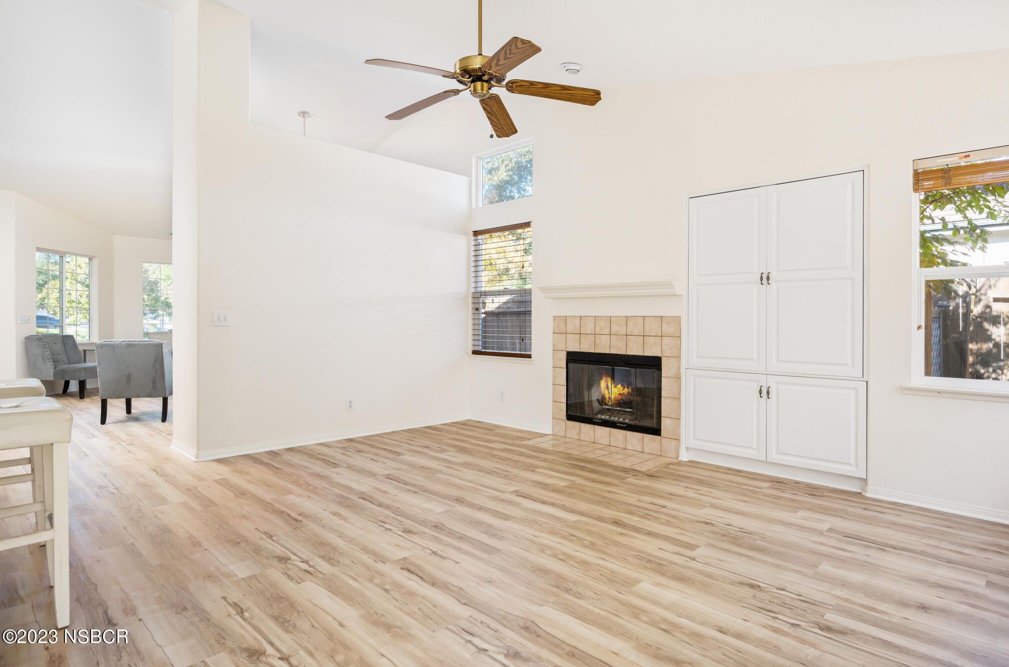 246 Ranch Road Buellton, CA 93427 - Photo 5 of 21 a view of a livingroom with a fireplace and wooden floor