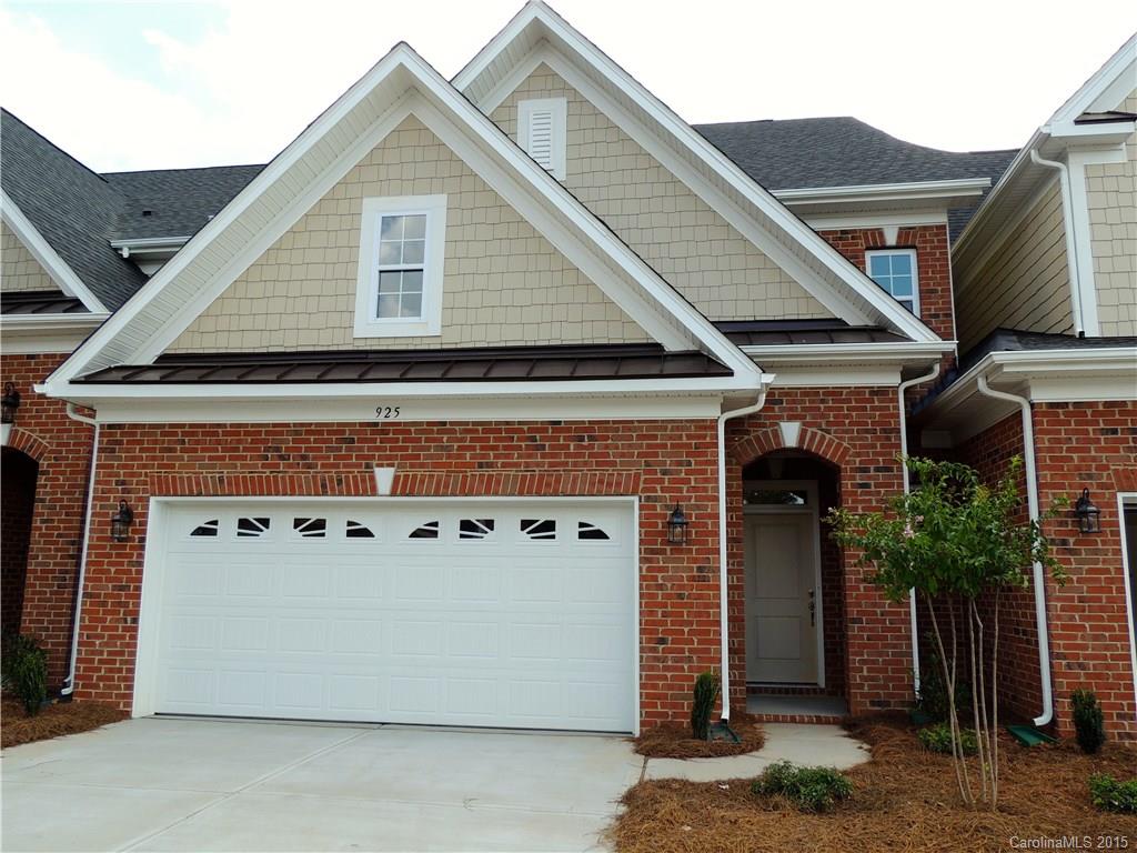 925 Ospre Lane, Unit 162 Fort Mill, SC 29708 - Photo 2 of 22 a view of a house with a garage