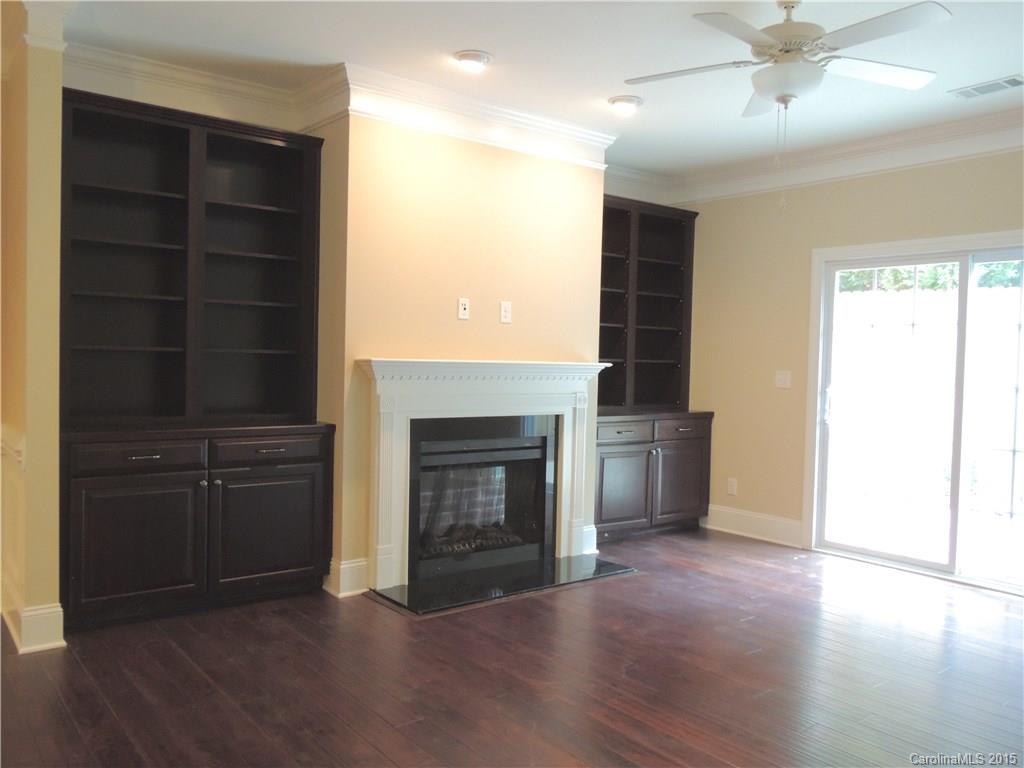 925 Ospre Lane, Unit 162 Fort Mill, SC 29708 - Photo 11 of 22 a view of a livingroom with a fireplace and cabinet