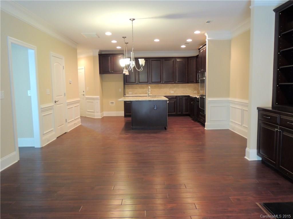 925 Ospre Lane, Unit 162 Fort Mill, SC 29708 - Photo 12 of 22 a view of a living room kitchen and a wooden floor