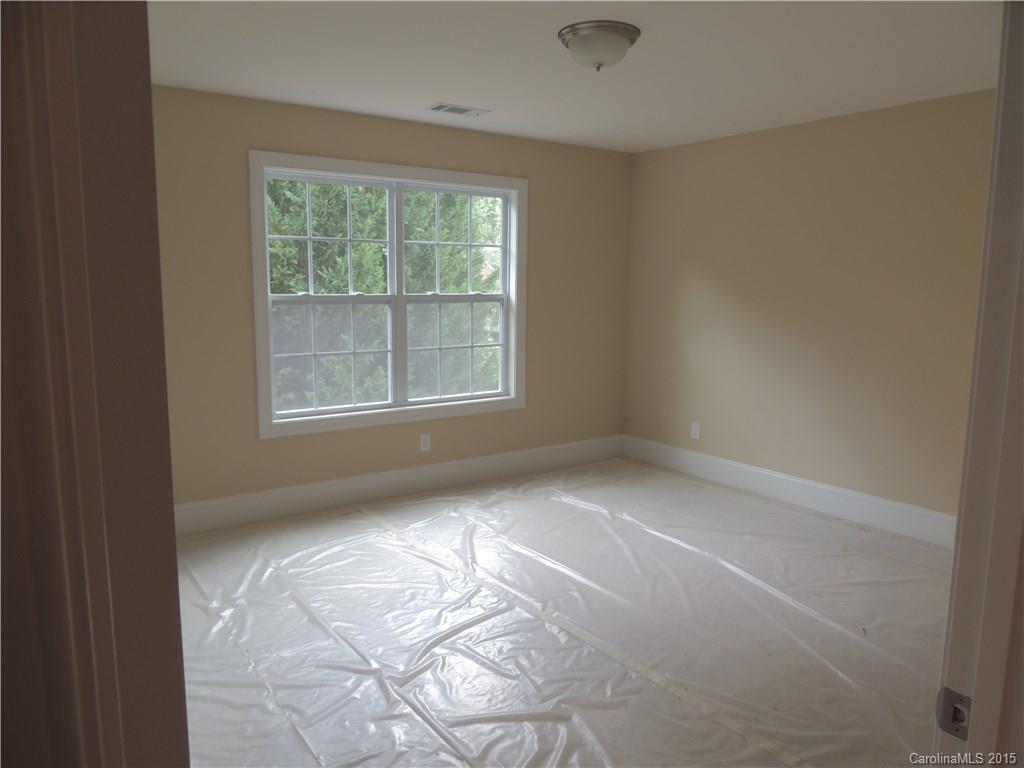 925 Ospre Lane, Unit 162 Fort Mill, SC 29708 - Photo 13 of 22 an empty room with a window