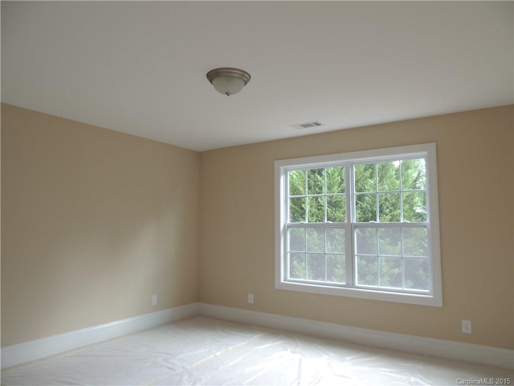 925 Ospre Lane, Unit 162 Fort Mill, SC 29708 - Photo 17 of 22 an empty room with a window