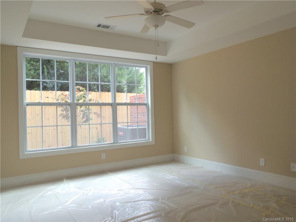 925 Ospre Lane, Unit 162 Fort Mill, SC 29708 - Photo 18 of 22 an empty room with a window