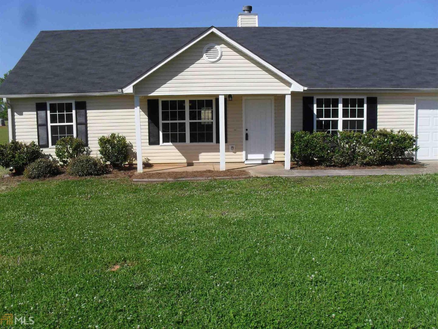 6760 Luthersville Road Gay, GA 30218 - Photo 1 of 1 a front view of a house with a yard and porch