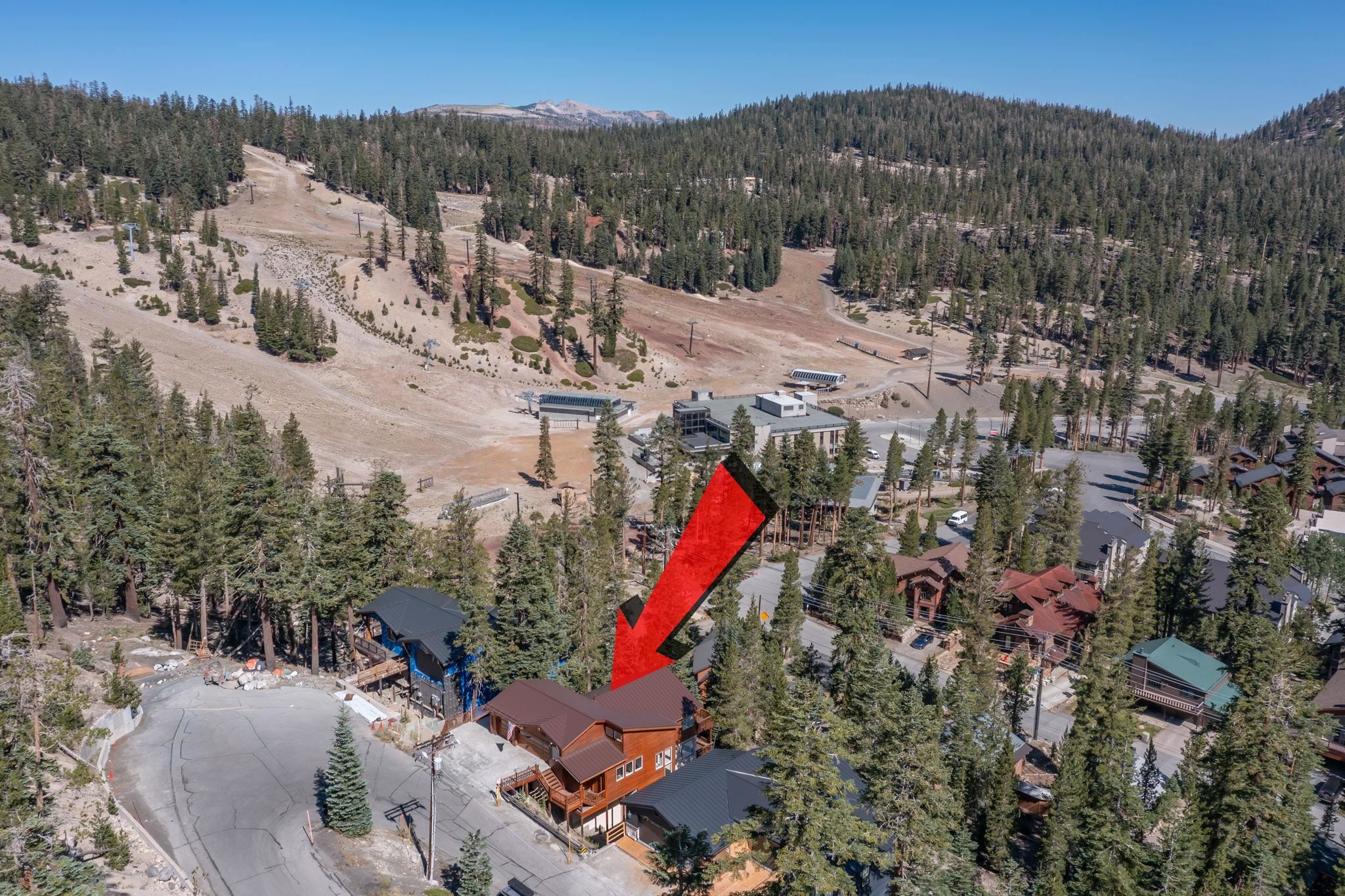 492 John Muir Road Mammoth Lakes, CA 93546 - Photo 2 of 33 Terraced property with wood siding and a private balcony, surrounded by mature trees