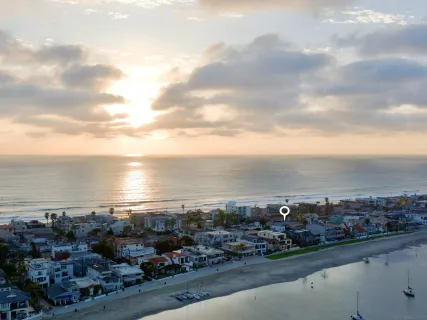a view of a city and ocean
