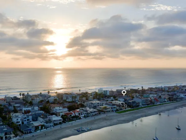 a view of a city and ocean