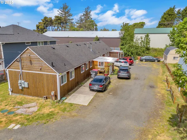 a view of a street with cars