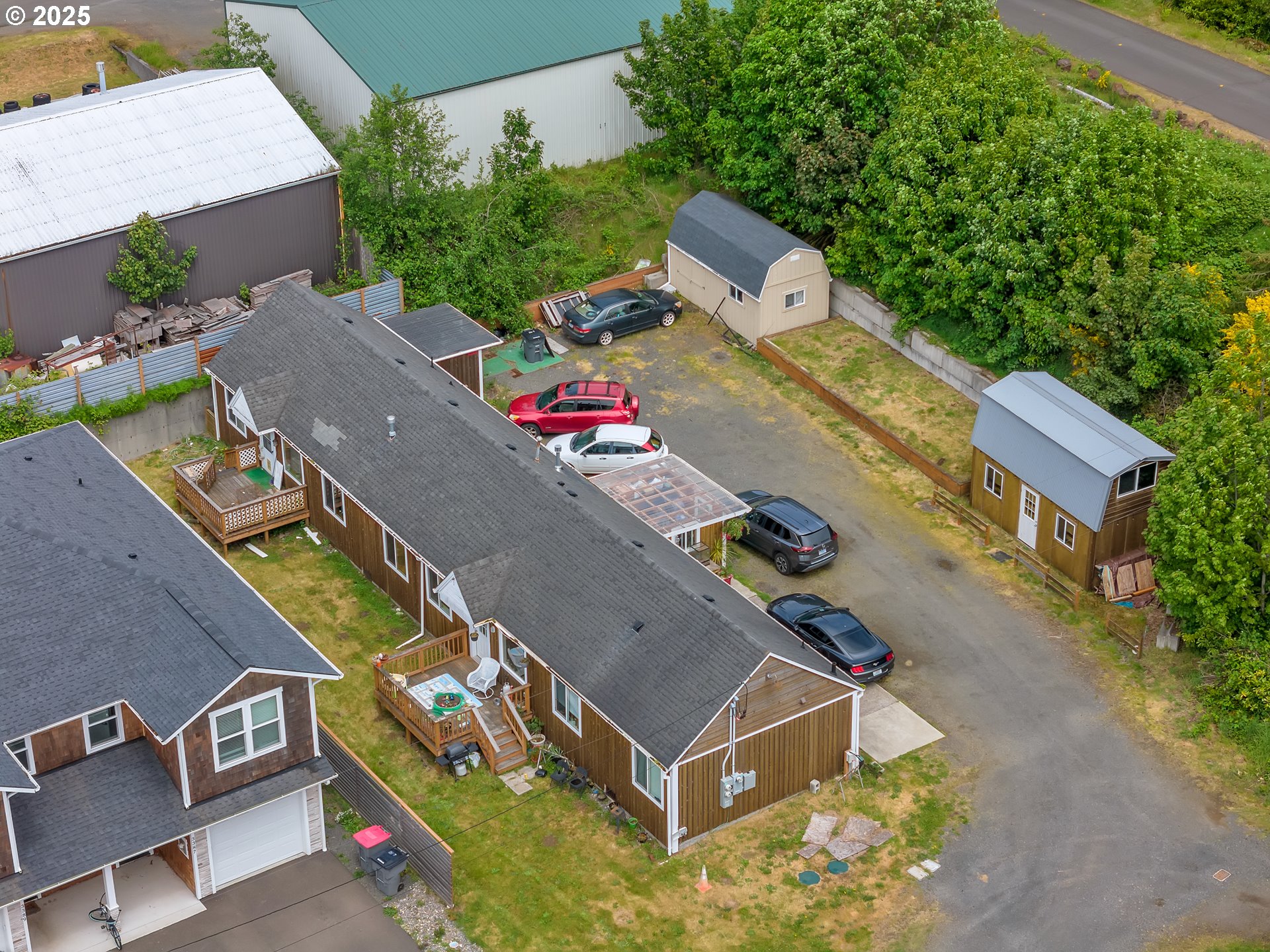 3379 North Highway 101 Warrenton, OR 97146 - Photo 8 of 34 an aerial view of a house with a swimming pool