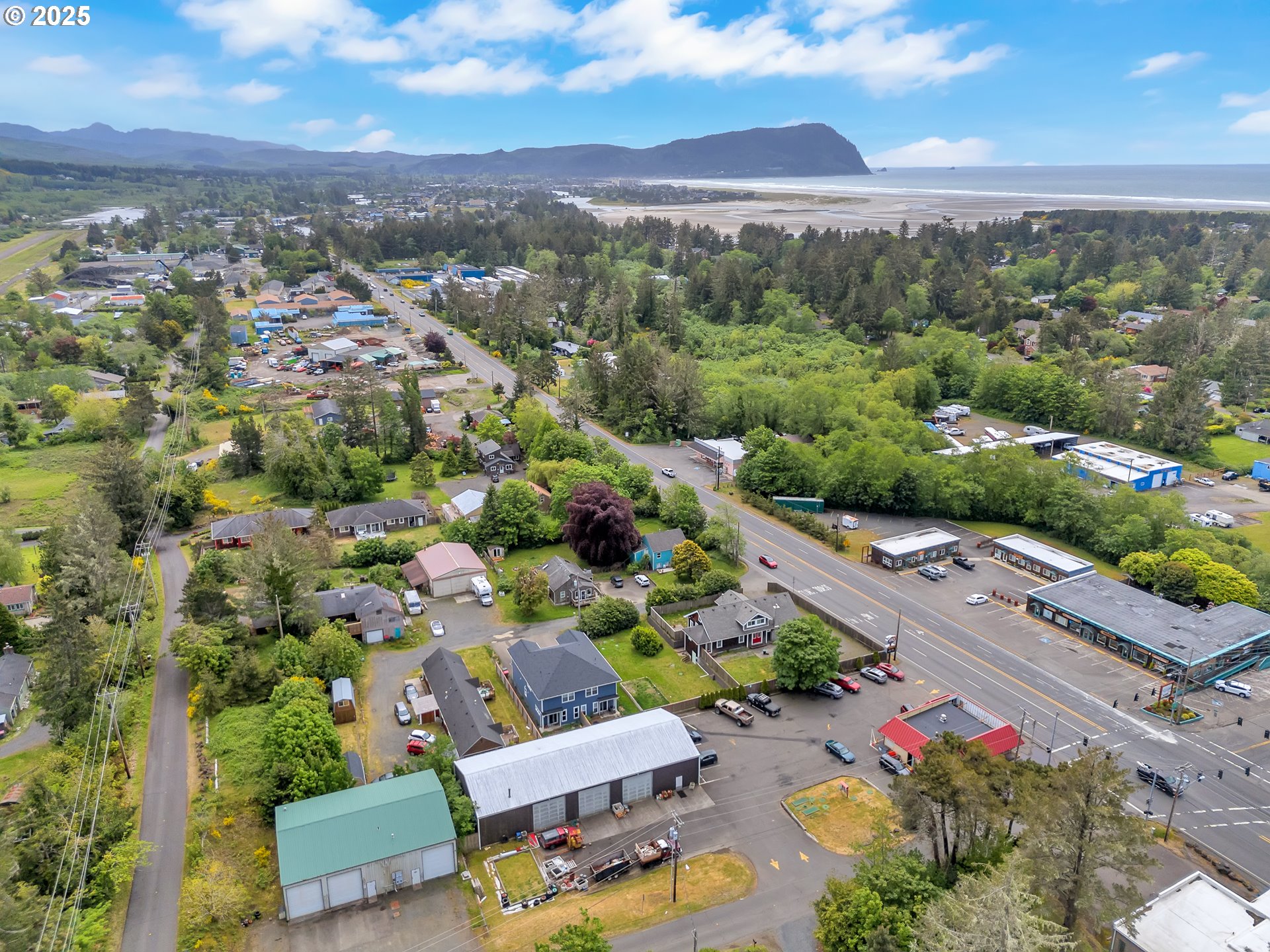 3379 North Highway 101 Warrenton, OR 97146 - Photo 10 of 34 an aerial view of a city with lots of residential buildings