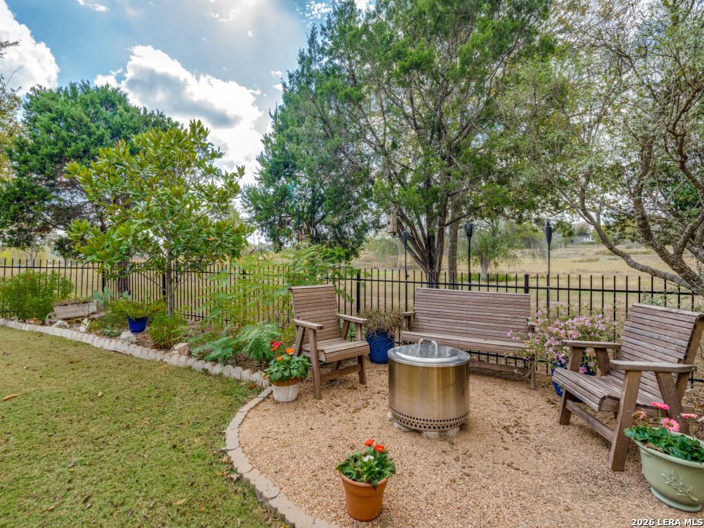 6050 Covers Schertz, TX 78108 - Photo 20 of 25 a view of a backyard with sitting area and garden