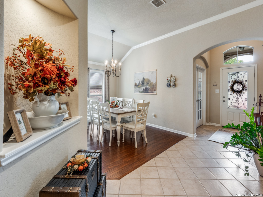 6050 Covers Schertz, TX 78108 - Photo 4 of 25 a dining room with furniture and wooden floor