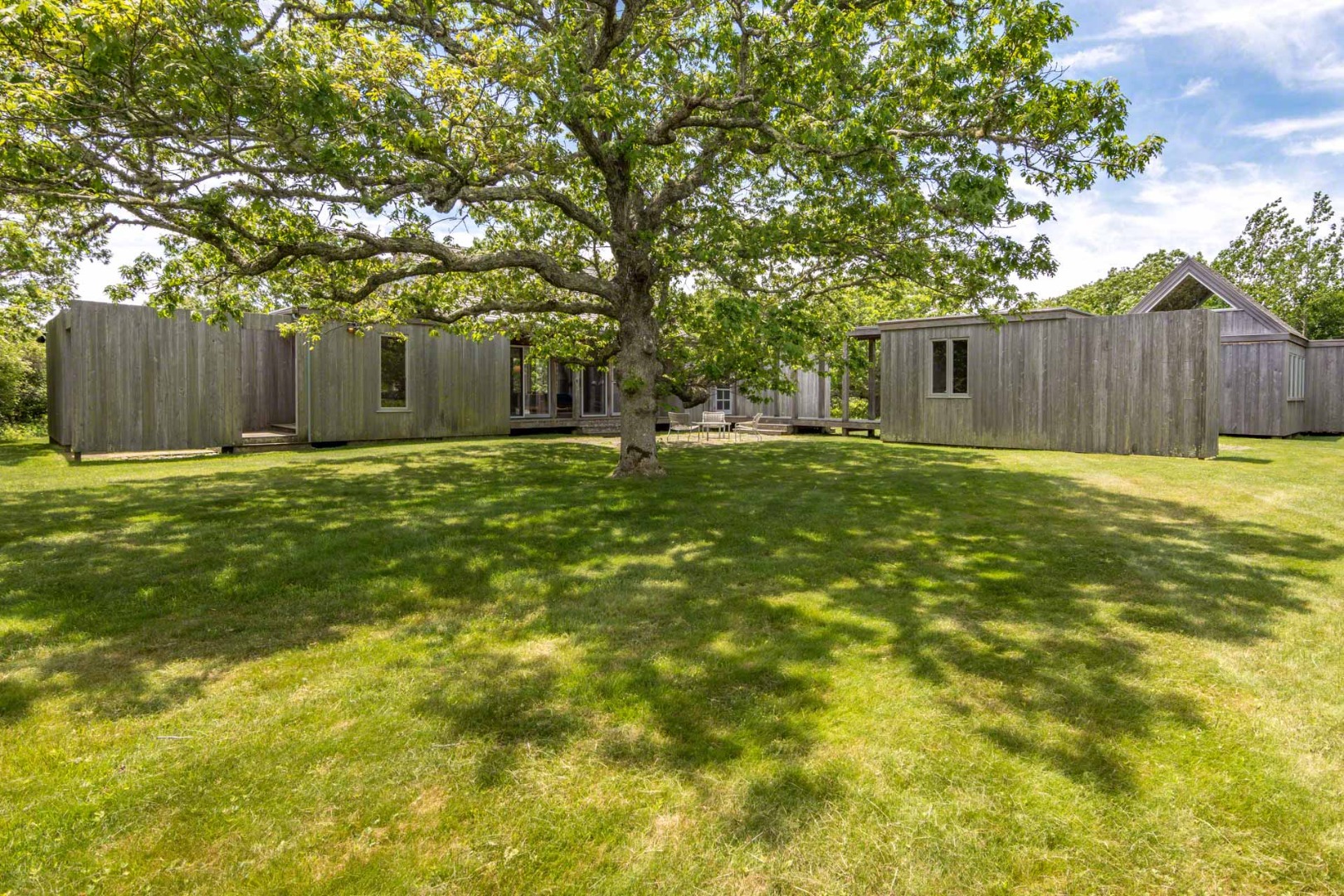 7 Black Point Road Chilmark, MA 02535 - Photo 1 of 44 a backyard of house with green space