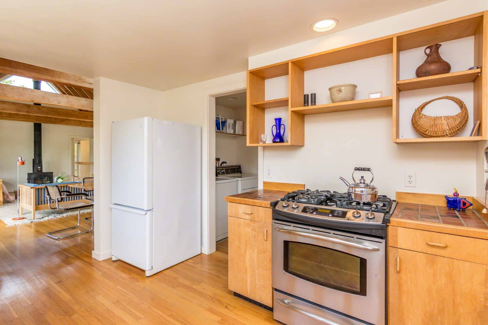 7 Black Point Road Chilmark, MA 02535 - Photo 15 of 44 a kitchen with stainless steel appliances granite countertop a stove and a refrigerator