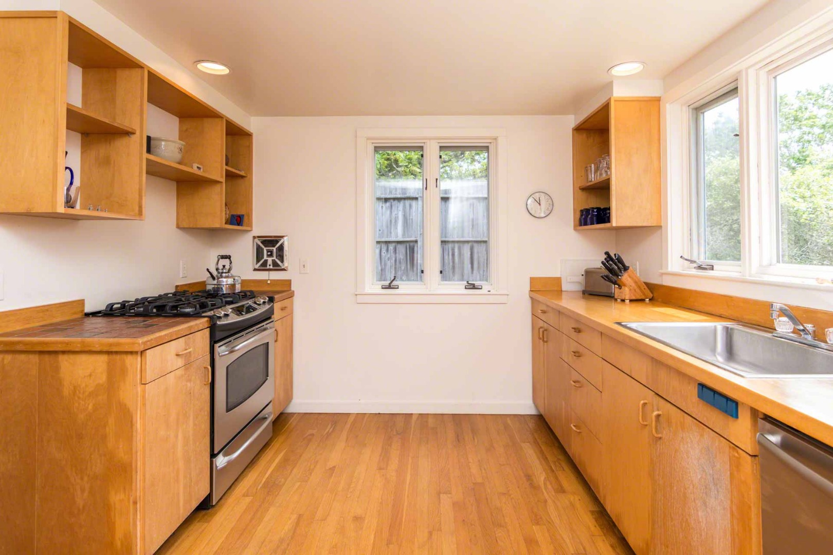 7 Black Point Road Chilmark, MA 02535 - Photo 16 of 44 a kitchen with stainless steel appliances a stove a sink and a microwave