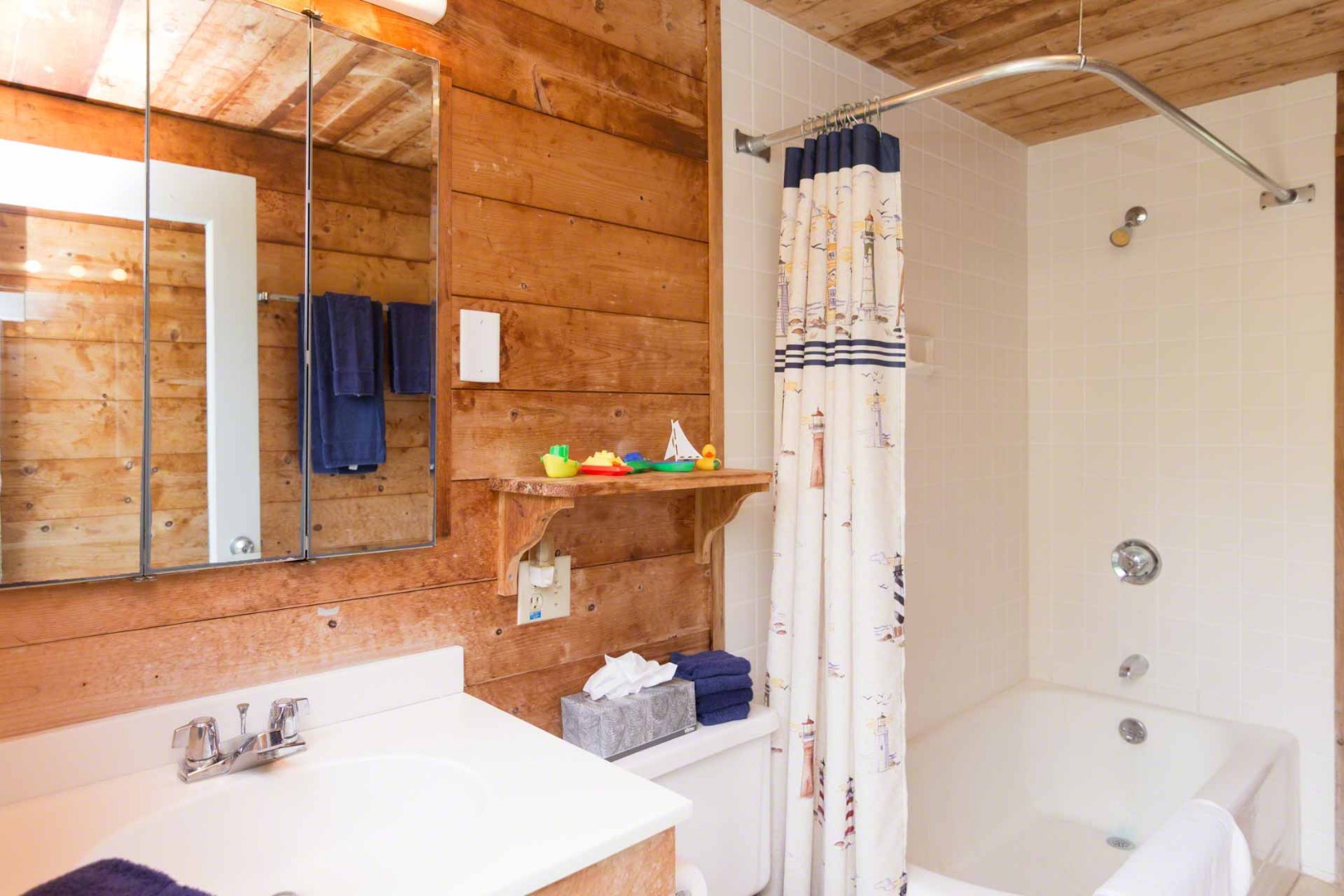 7 Black Point Road Chilmark, MA 02535 - Photo 26 of 44 a bathroom with a bathtub and shower