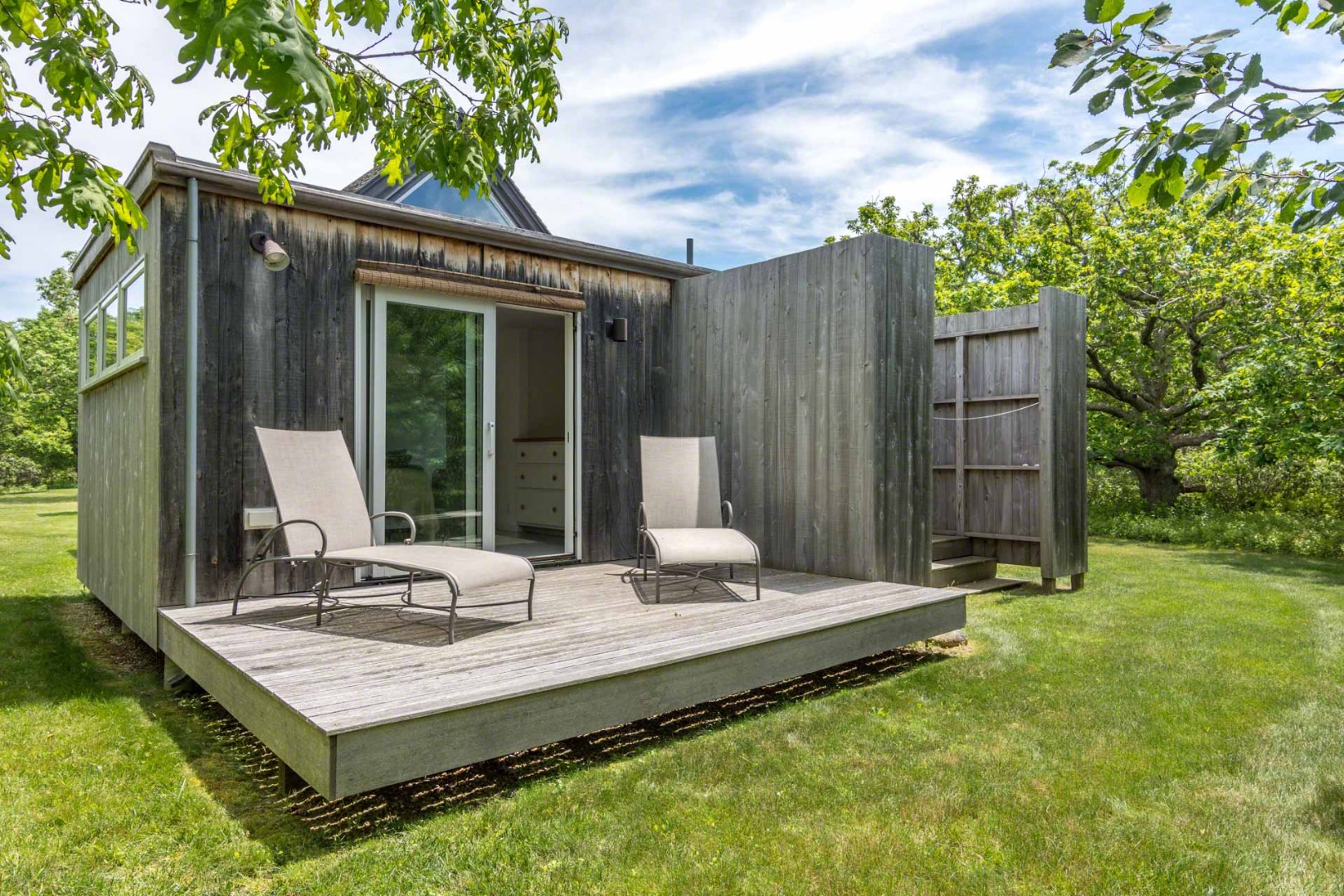 7 Black Point Road Chilmark, MA 02535 - Photo 27 of 44 a view of a backyard with a patio