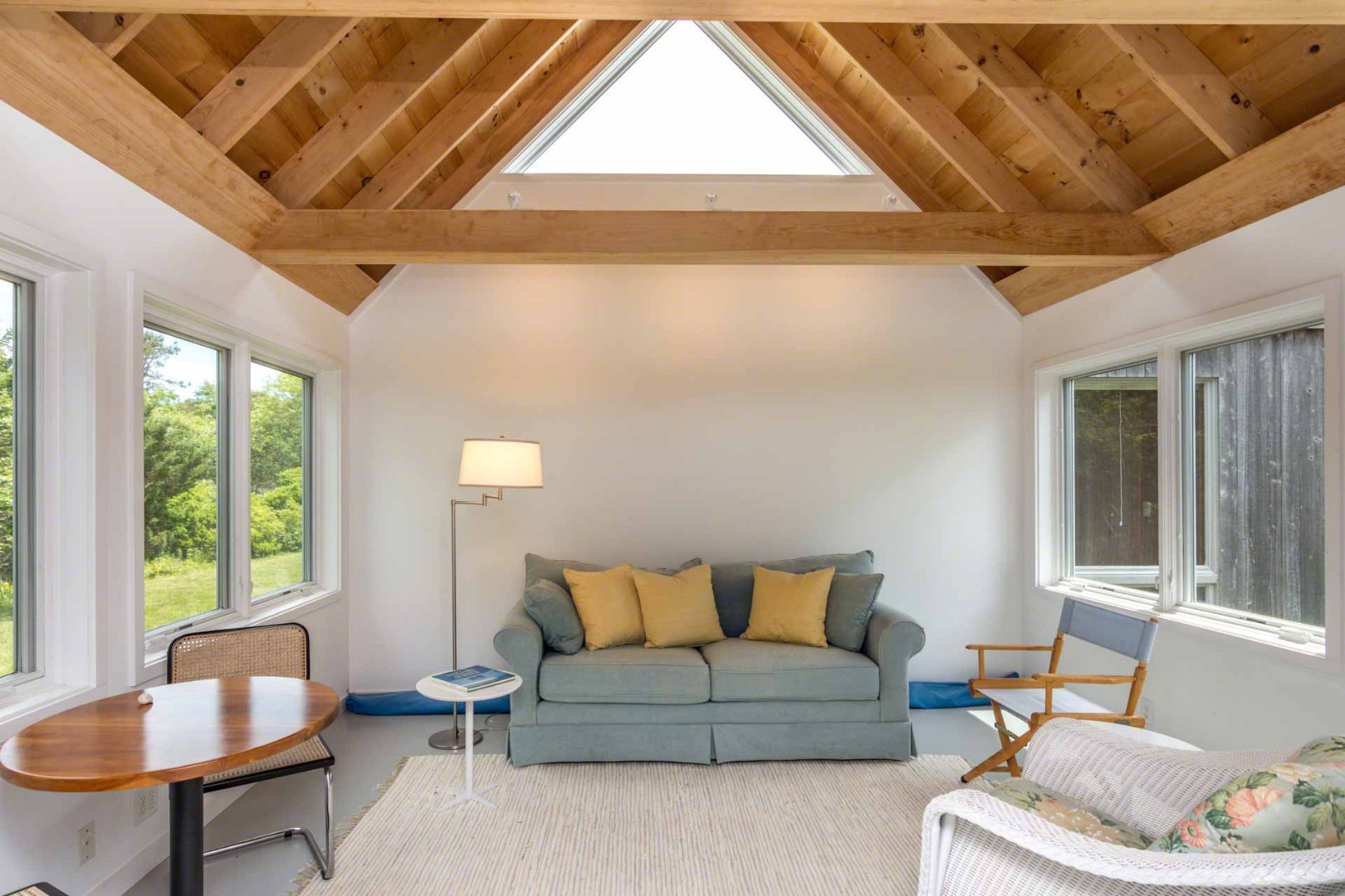 7 Black Point Road Chilmark, MA 02535 - Photo 28 of 44 a living room with furniture and a potted plant