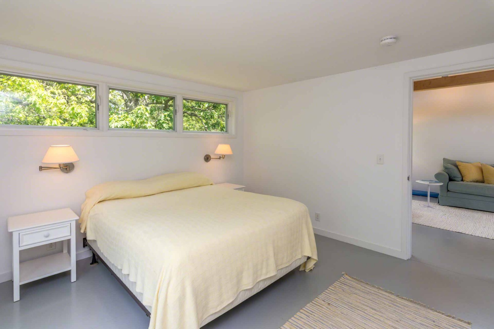 7 Black Point Road Chilmark, MA 02535 - Photo 32 of 44 a large bed sitting in a bedroom next to a window