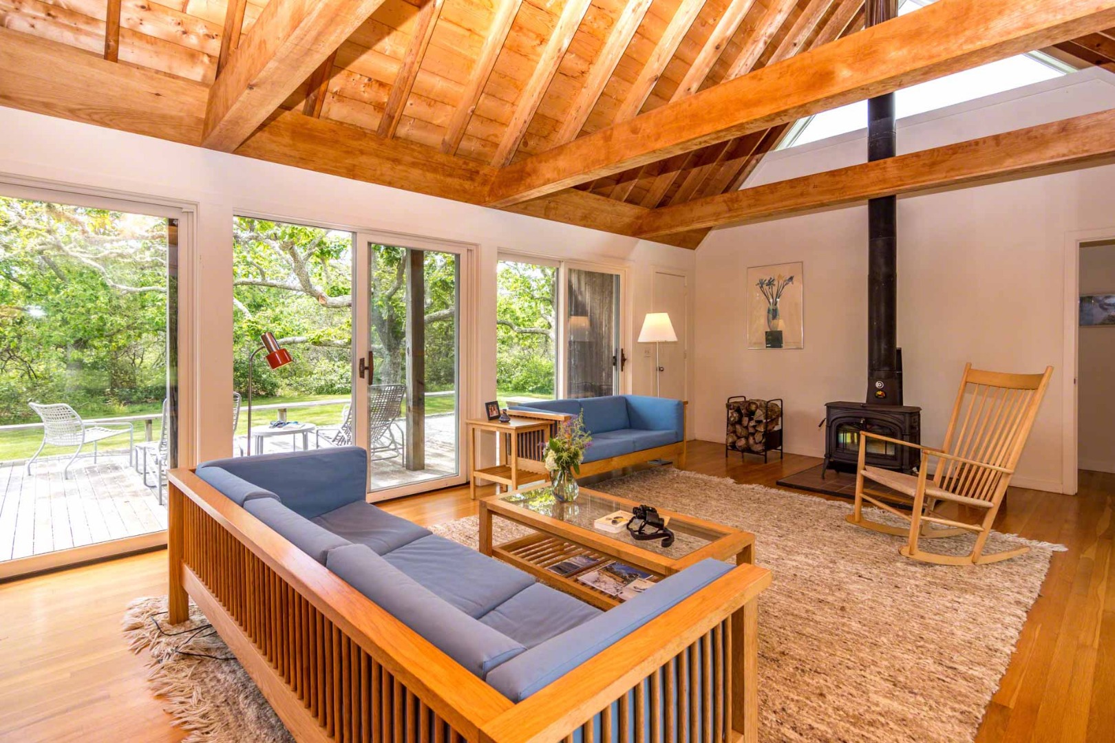 7 Black Point Road Chilmark, MA 02535 - Photo 8 of 44 a living room with furniture a rug wooden floor and a large window
