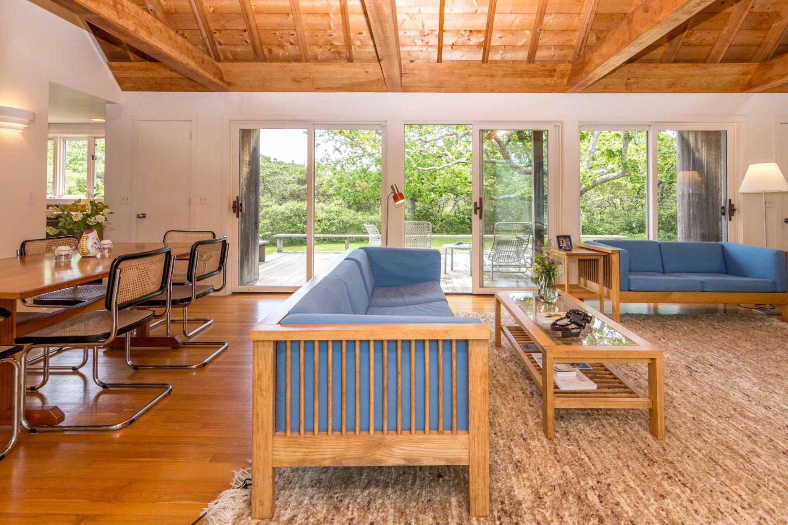 7 Black Point Road Chilmark, MA 02535 - Photo 10 of 44 a living room with furniture and a floor to ceiling window
