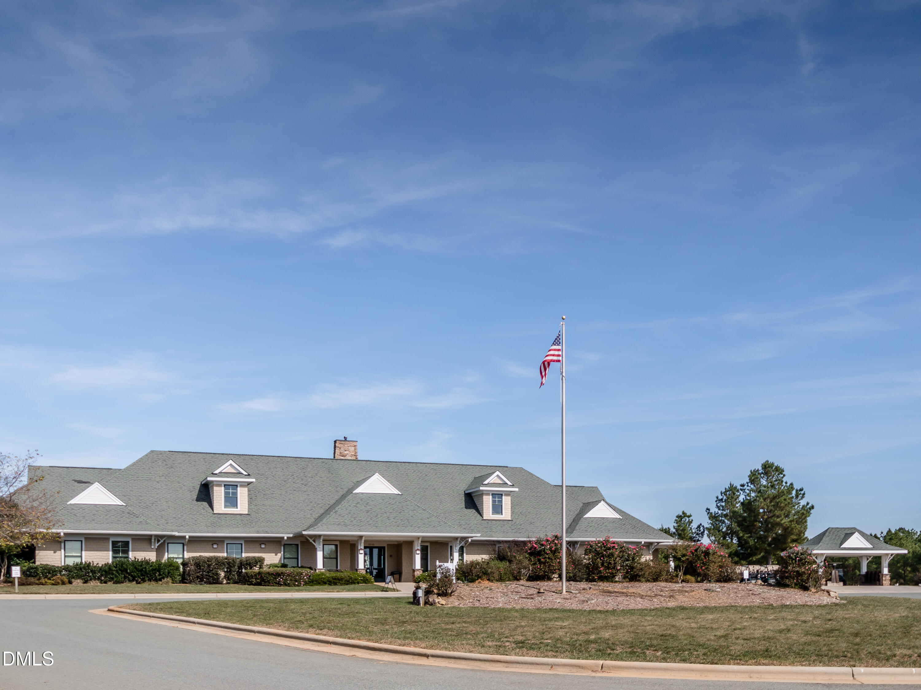 558 Chapel Ridge Drive Pittsboro, NC 27312 - Photo 30 of 47 a view of a big house in a big yard with large trees