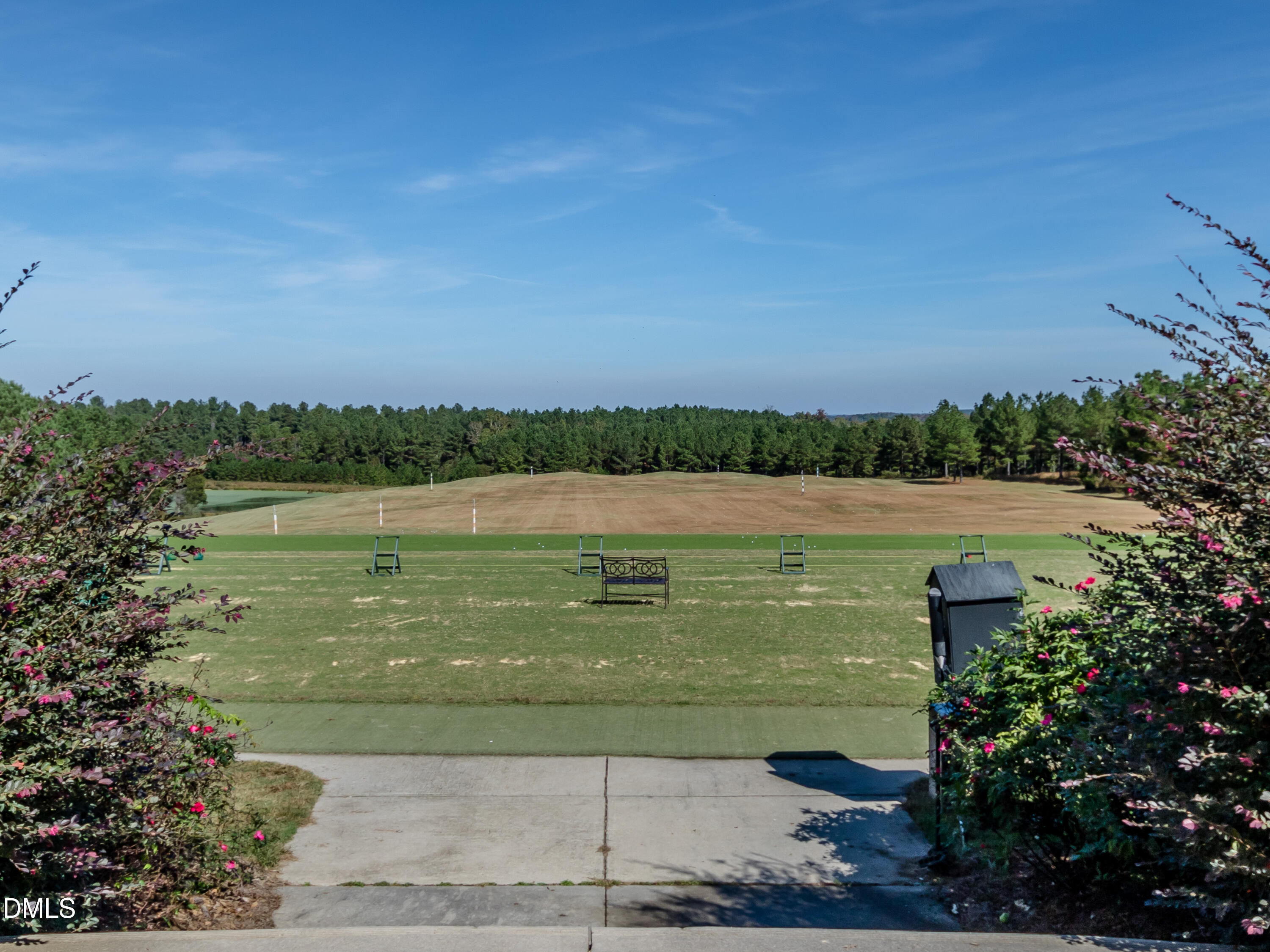 558 Chapel Ridge Drive Pittsboro, NC 27312 - Photo 44 of 47 a view of a lake with a big yard