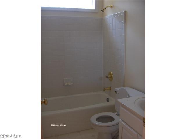 5306 Chestnut Ridge Drive Summerfield, NC 27358 - Photo 7 of 15 Other. Hall bath with ceramic surround & bright transom window above tub