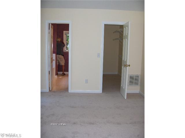 5306 Chestnut Ridge Drive Summerfield, NC 27358 - Photo 8 of 15 Master Bedroom. MBR has oversized walk-in closet plus 2nd closet and luxury MBA