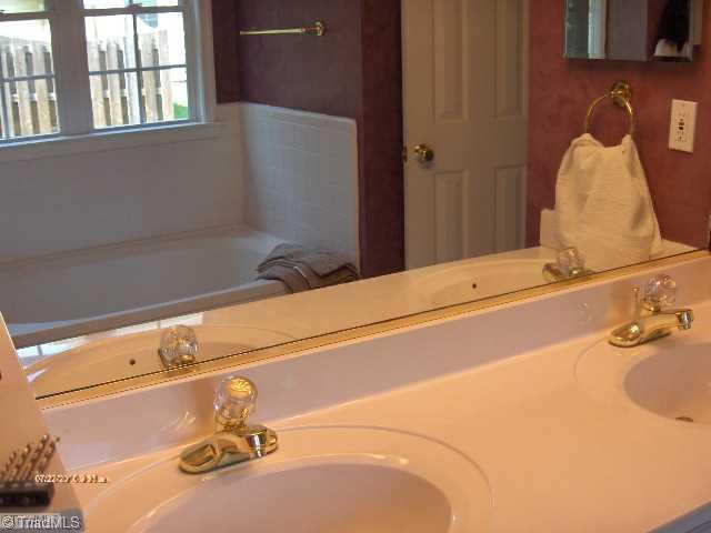 5306 Chestnut Ridge Drive Summerfield, NC 27358 - Photo 10 of 15 Master Bath/Spa. Dual Vanities, garden tub & separate shower
