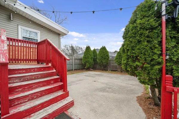 a view of a backyard with a deck