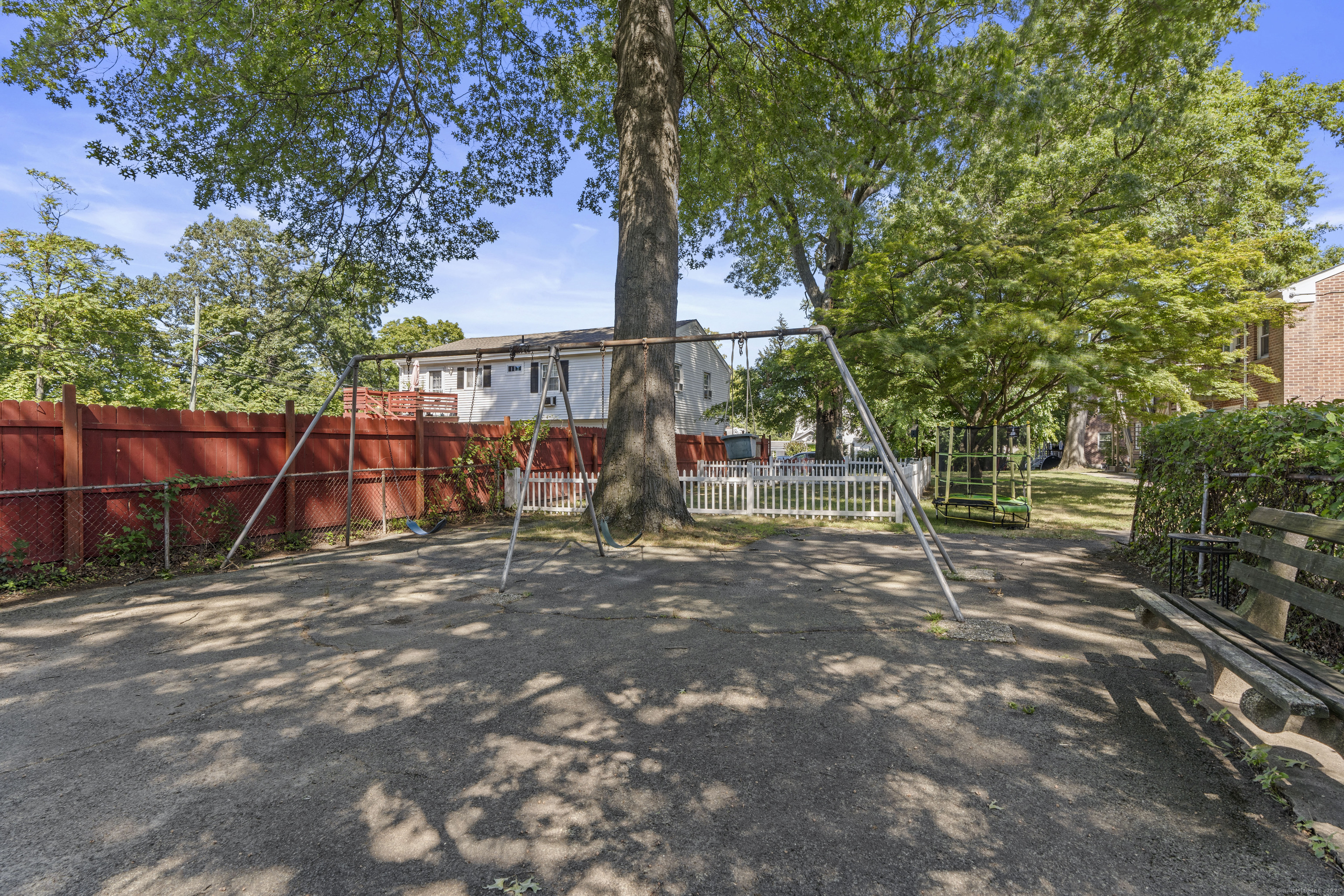 66 Blachley Road, Unit C Stamford, CT 06902 - Photo 18 of 26 a view of street with trees