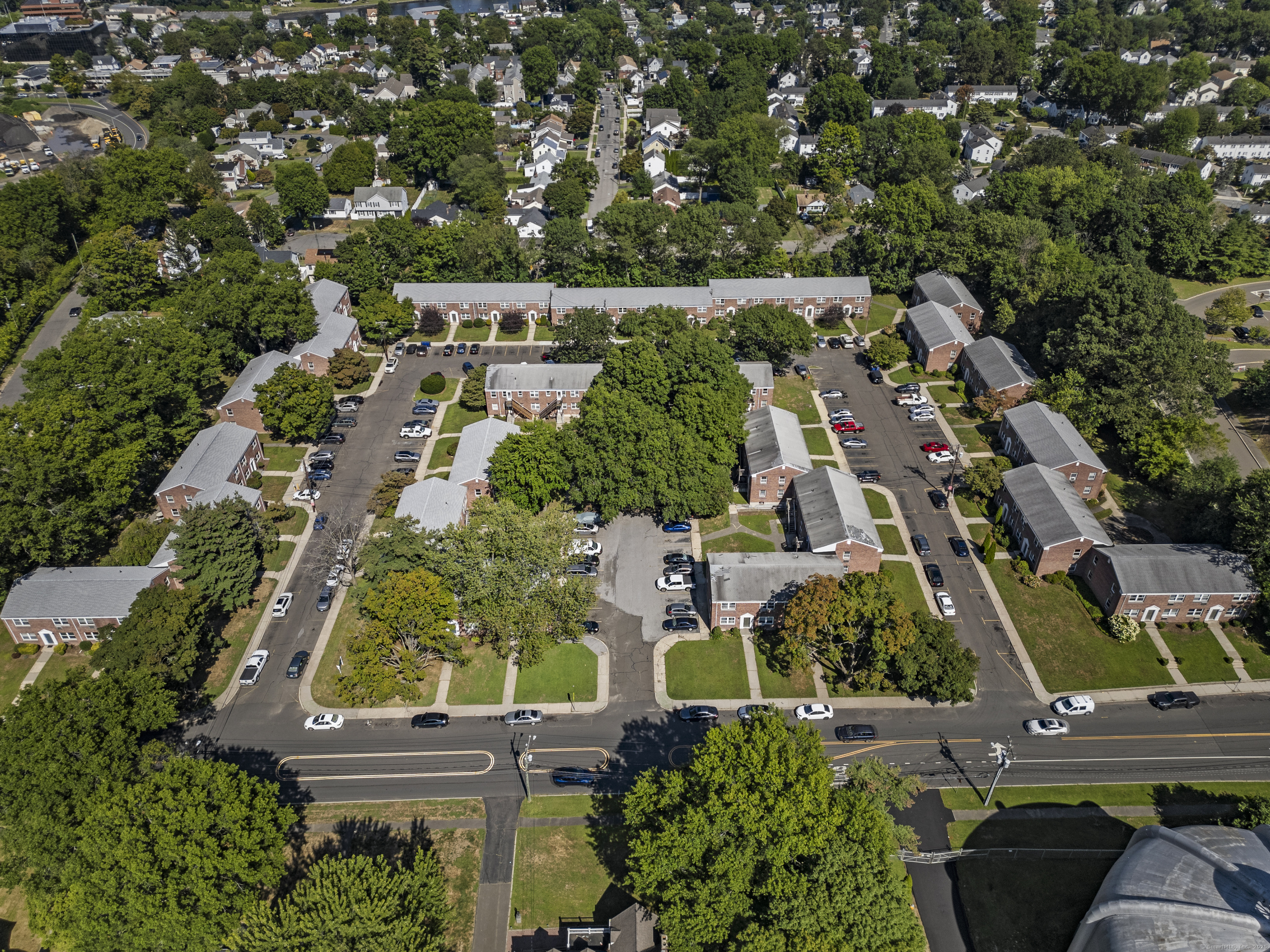 66 Blachley Road, Unit C Stamford, CT 06902 - Photo 22 of 26 an aerial view of residential houses with outdoor space and street view
